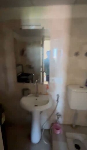 Bathroom in 2 BHK Apartment at Gaur Atulyam, Omicron I Greater Noida – for Rent