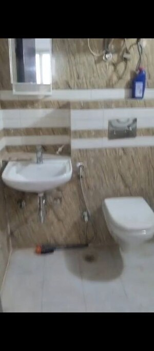 Bathroom in 2.5 BHK Apartment at Unnati Fortune The Aranya, Sector 119 – for Rent