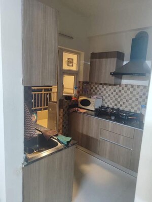 Kitchen in 3.5 BHK Apartment at Adani M2K Oyster Grande, Sector 102 – for Sale