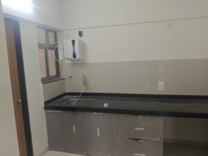 Kitchen in 3 BHK Apartment at Nivasa Enchante, Lohgaon – for Rent