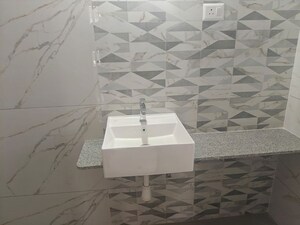 Bathroom in 3 BHK Apartment at Nivasa Enchante, Lohgaon – for Rent