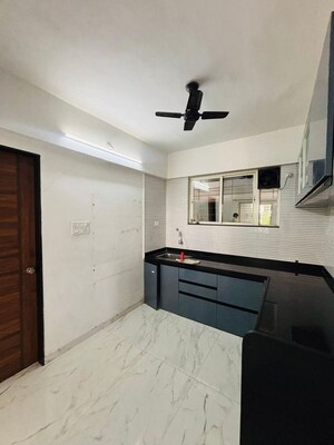 Kitchen in 2 BHK Apartment at Atlanta Apartment Wakad, Wakad – for Rent