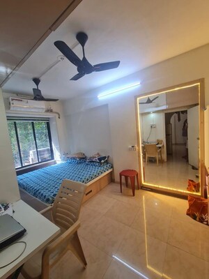Living Room in 2 BHK Apartment at Amrut Vani CHS, Chembur – for Sale