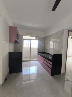 Kitchen in 3 BHK Apartment at Ajmera Housing Society, Pimpri – for Rent