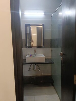 Bathroom in 4 BHK Builder Floor at Mansarover Garden – for Sale