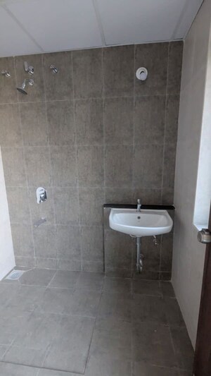 Bathroom in 3 BHK Apartment at Mantra Mesmer, Keshav Nagar – for Rent