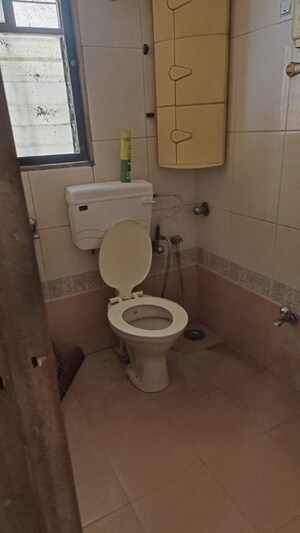 Bathroom in 2 BHK Apartment at Runwal Regency, Majiwada – for Rent