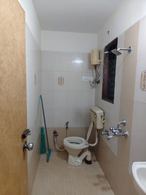 Bathroom in 2 BHK Apartment at VKG Beverly Hills, Andheri East – for Rent