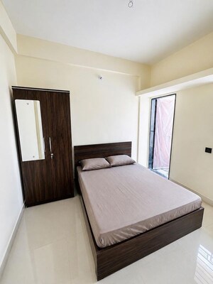 Bedroom in 1 BHK Apartment at Wadgaon Sheri – for Rent