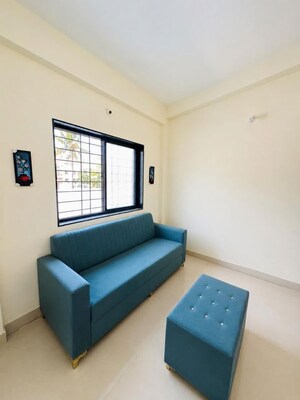 Living Room in 1 BHK Apartment at Wadgaon Sheri – for Rent
