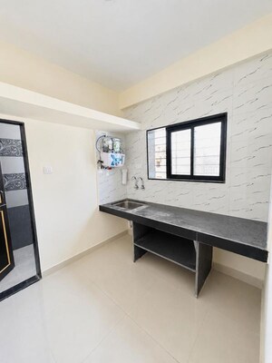 Kitchen in 1 BHK Apartment at Wadgaon Sheri – for Rent