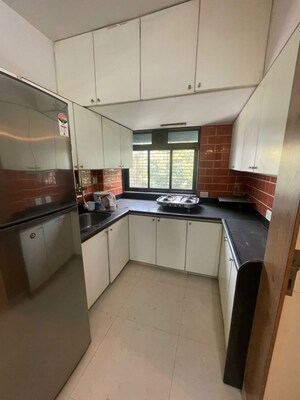 Kitchen in 3 BHK Apartment at Satyam CHS Andheri West, Andheri West – for Rent