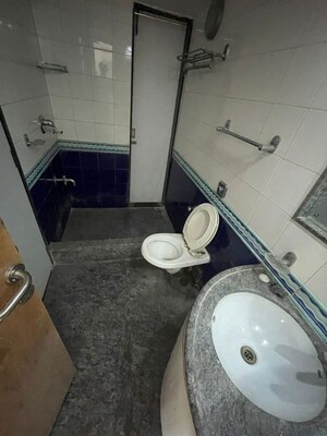 Bathroom in 3 BHK Apartment at Satyam CHS Andheri West, Andheri West – for Rent