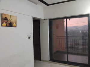 Living Room in 2 BHK Apartment at Shapoorji Pallonji Joyville Hinjewadi, Hinjewadi – for Rent