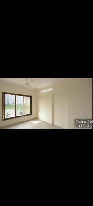 Room in 2 BHK Apartment at Abrol Signature, Malad West – for Sale
