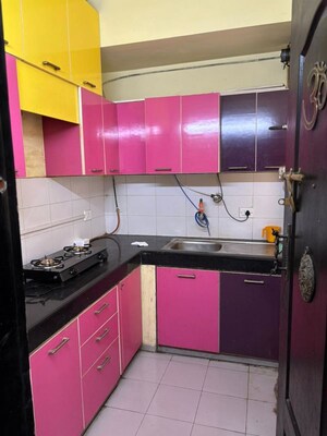 Kitchen in 2 BHK Apartment at Unitech Uniworld Downtown, Rajarhat – for Rent