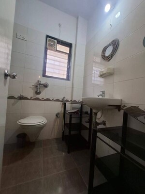Bathroom in 2.5 BHK Apartment at Vasant Vihar – for Rent
