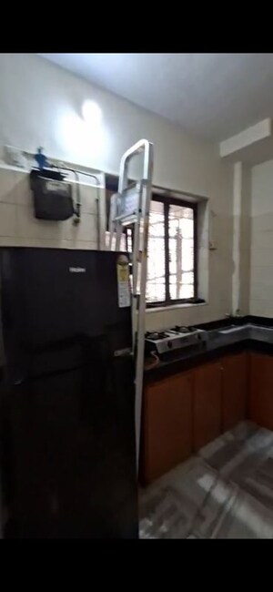 Kitchen in 2 BHK Apartment at Ahimsa Marg, Malad West – for Rent