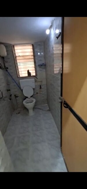 Bathroom in 2 BHK Apartment at Ahimsa Marg, Malad West – for Rent