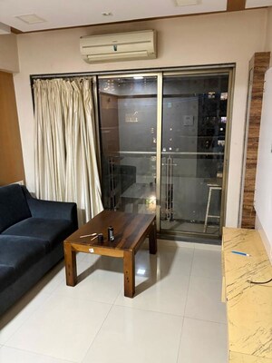 Living Room in 2 BHK Apartment at Raj Infinia, Malad West – for Sale
