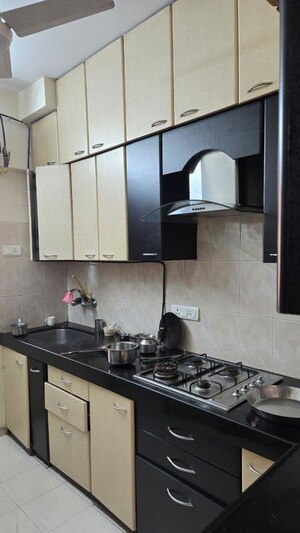Kitchen in 2 BHK Apartment at Raj Infinia, Malad West – for Sale