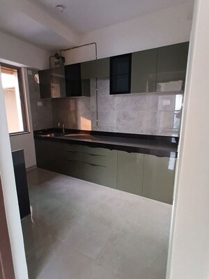 Kitchen in 2 BHK Apartment at Raj Infinia, Malad West – for Sale