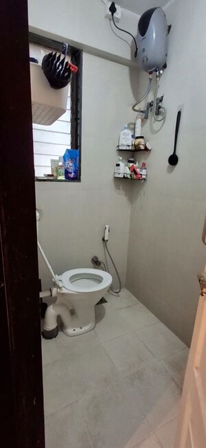 Bathroom in 2 BHK Apartment at Raj Infinia, Malad West – for Sale