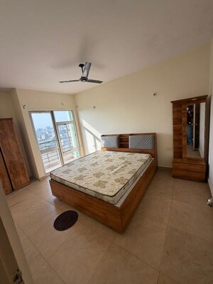 Bedroom in 3 BHK Apartment at Ansal Celebrity Meadows, Sushant Golf City – for Rent