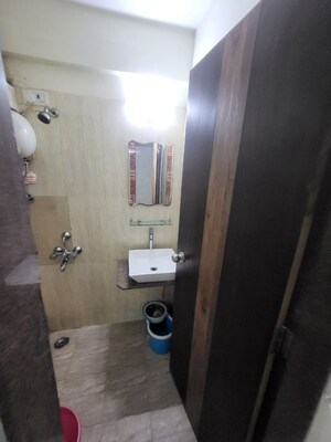 Bathroom in 2 BHK Apartment at Chogle Ekdant Height, Borivali East – for Rent