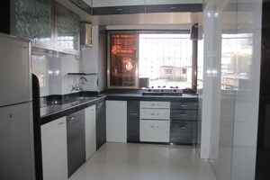 Kitchen in 1 BHK Apartment at Hari Dham CHS, Andheri East – for Sale
