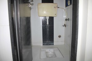 Attached Bathroom in 1 BHK Apartment at Hari Dham CHS, Andheri East – for Sale