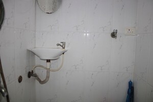 Attached Bathroom in 1 BHK Apartment at Hari Dham CHS, Andheri East – for Sale