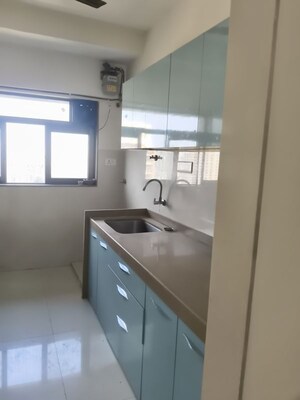 Kitchen in 2 BHK Apartment at Lotus Sky Garden, Malad West – for Rent