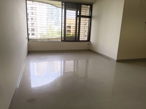 Room in 2 BHK Apartment at Rustomjee Riviera, Malad West – for Rent