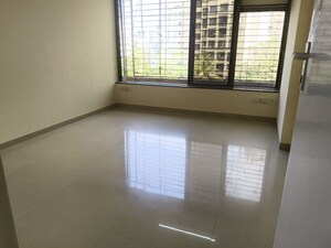 Room in 2 BHK Apartment at Rustomjee Riviera, Malad West – for Rent