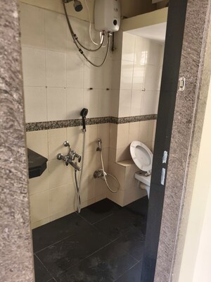 Bathroom in 2 BHK Apartment at Rustomjee Riviera, Malad West – for Rent