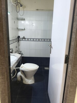 Bathroom in 2 BHK Apartment at Rustomjee Riviera, Malad West – for Rent