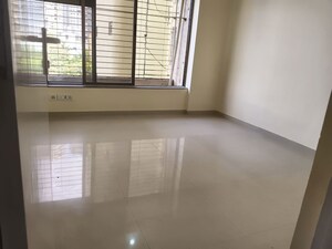 Room in 2 BHK Apartment at Rustomjee Riviera, Malad West – for Rent