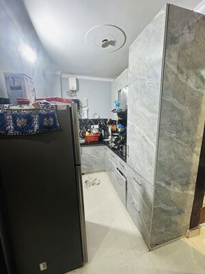 Kitchen in 2 BHK Builder Floor at Mahavir Enclave – for Sale