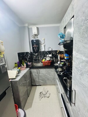 Kitchen in 2 BHK Builder Floor at Mahavir Enclave – for Sale