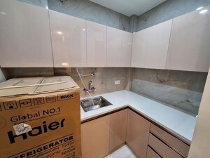 Kitchen in Studio Apartment at Ansal API Esencia, Sector 67 – for Rent