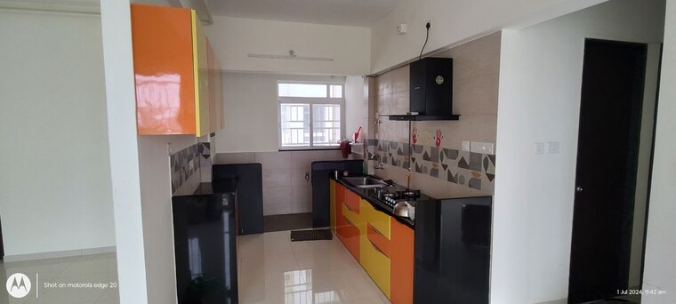 Kitchen, kolte-patil-life-republic-r-10 2.5 Bedroom 930 Sq.Ft. Apartment In Jambhe Pune 10379091