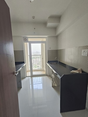 Kitchen in 2 BHK Apartment at Lodha Amara, Kolshet Road – for Sale