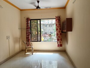 Bedroom in 1 BHK Apartment at Riddhi Garden, Malad East – for Sale