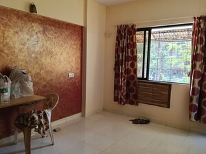 Living Room in 1 BHK Apartment at Riddhi Garden, Malad East – for Sale