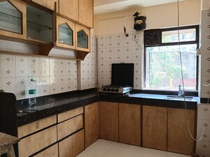 Kitchen in 1 BHK Apartment at Riddhi Garden, Malad East – for Sale