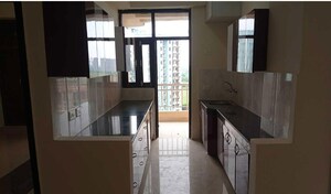 Kitchen in 3 BHK Apartment at KM Residency, Raj Nagar Extension – for Rent