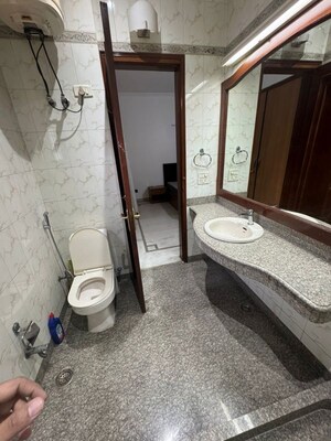 Bathroom in 4 BHK Builder Floor at Nehru Enclave – for Rent