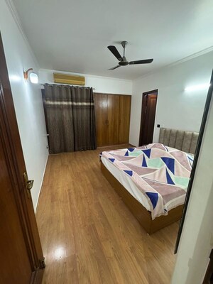 Bedroom in 4 BHK Builder Floor at Nehru Enclave – for Rent