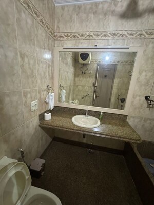Bathroom in 4 BHK Builder Floor at Nehru Enclave – for Rent